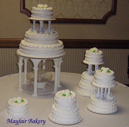 Cascading tiers with icing ribbon